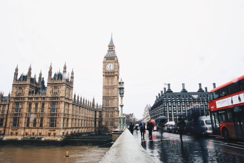 The Big Ben with people walking nearby
