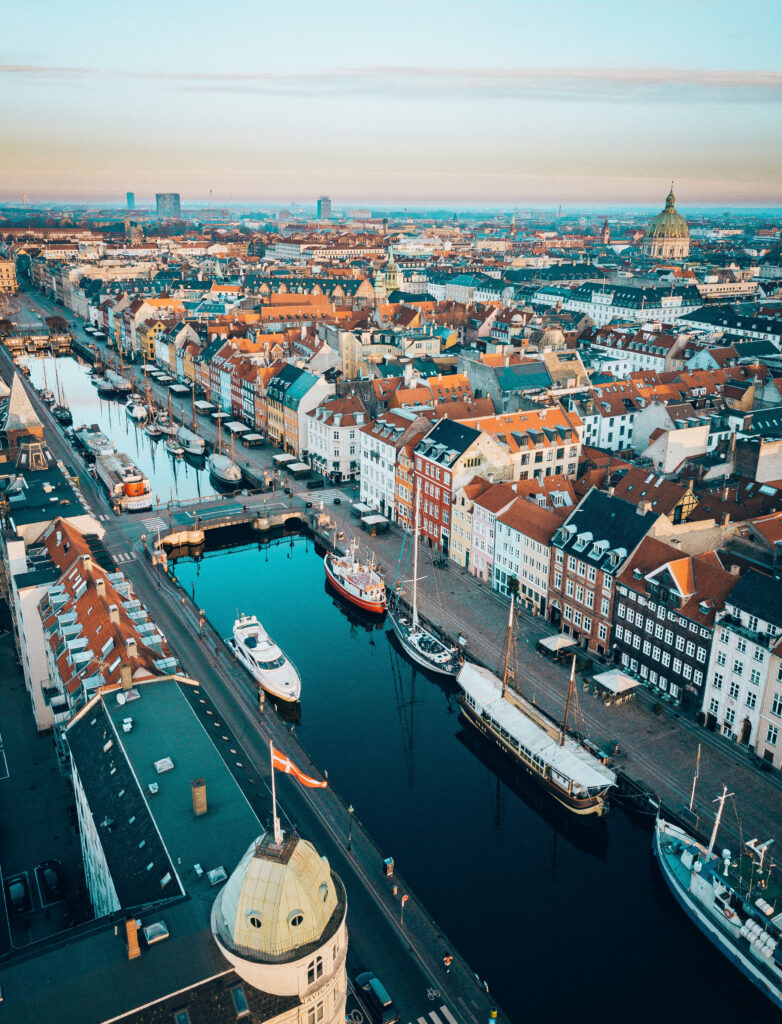aerial view of concrete buildings and boats