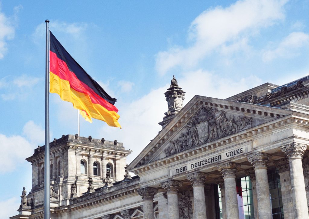 german flag in front of government building